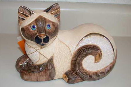 Resting Siamese Cat